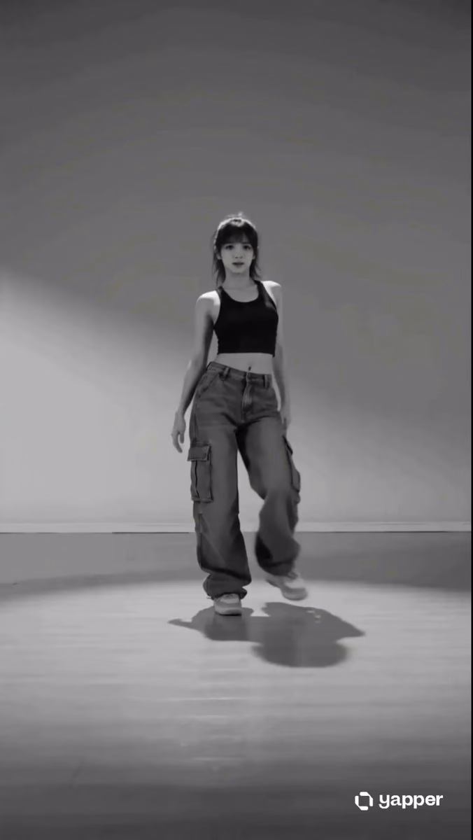 A dancer in a bright studio